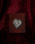 The Stake Brooch